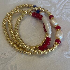 Elegant Gold and Red Beaded Bracelet